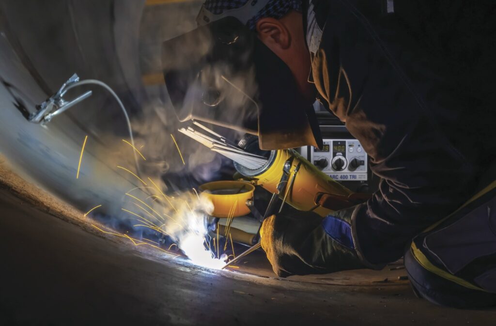 A man doing some welding work
