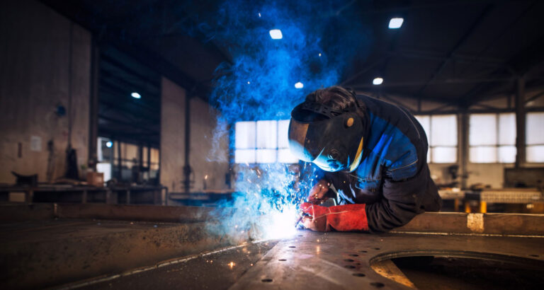 A man doing some welding work